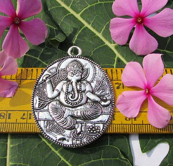 Beautiful silver And gold temple pendant Size Scale